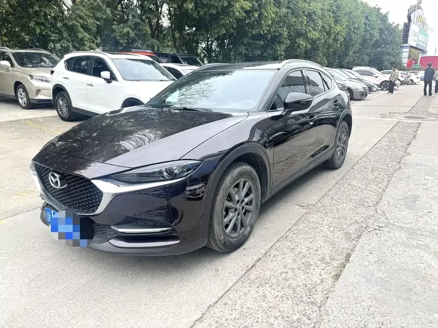 Mazda CX-4 2021 2.0L Automatic 2WD Blue Sky Premium Edition 2023 — фото 1, купить с доставкой в Москву