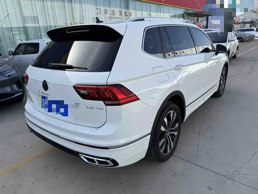Volkswagen Tiguan L Tiguan L 2024 Outstanding Model 330TSI Automatic Two-Wheel Drive R-Line Dragon Glory Edition 2025 — миниатюра 2