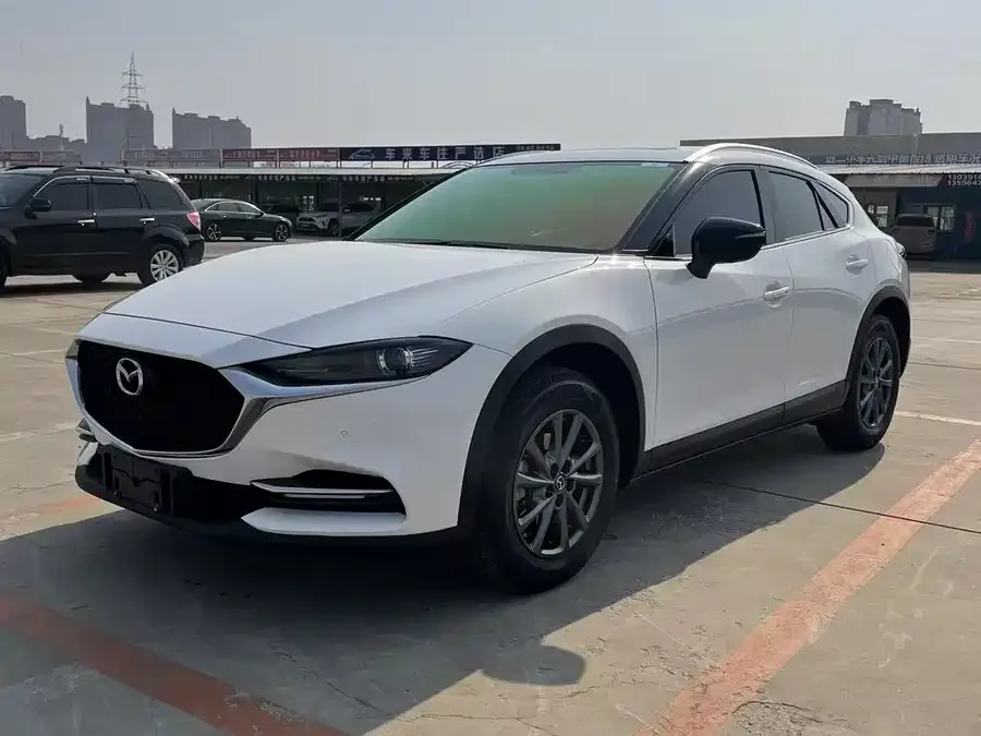 Mazda CX-4 2021 2.0L Automatic 2WD Blue Sky Premium Edition 2023 — фото 1, купить с доставкой в Москву