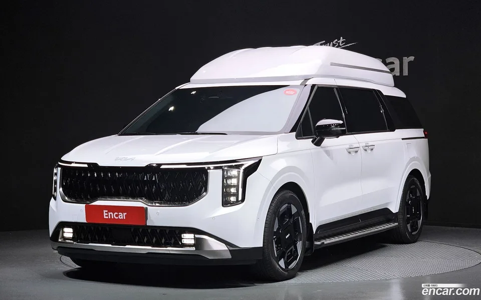 Kia Carnival HEV 7 () 2024 — фото 1, купить с доставкой в Москву