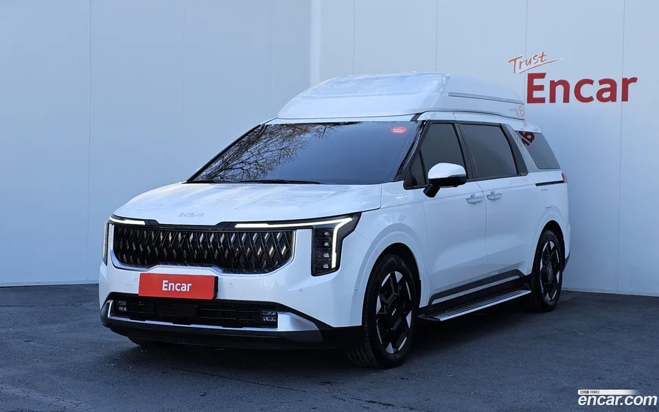 Kia Carnival HEV 7 2024 — фото 1, купить с доставкой в Москву