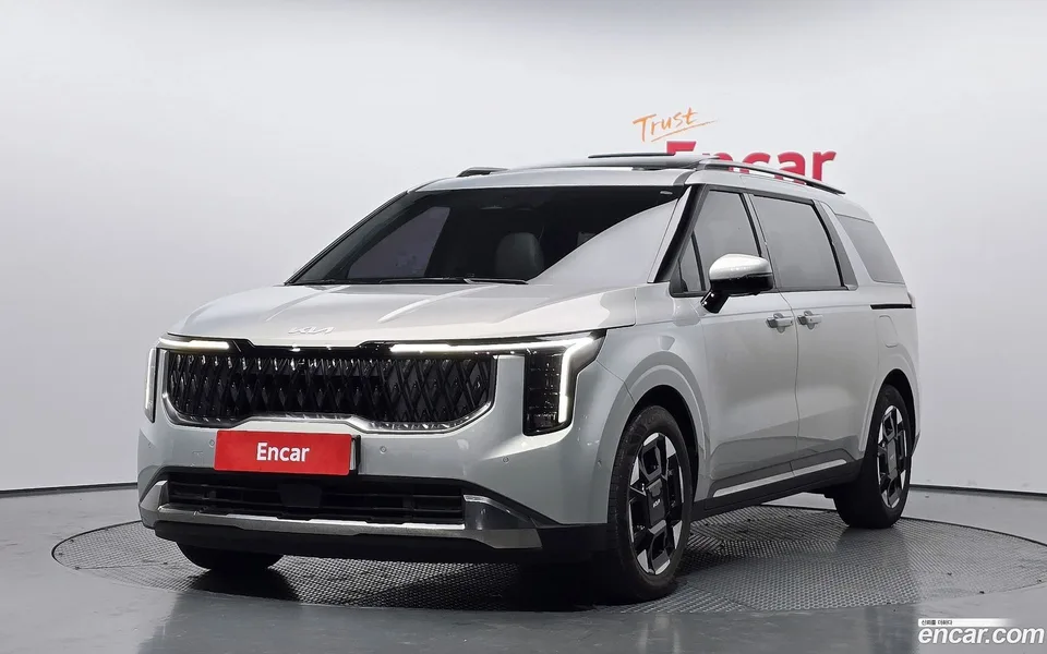 Kia Carnival HEV 7 2024 — фото 1, купить с доставкой в Москву