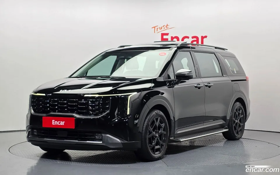 Kia Carnival HEV 7 2024 — фото 1, купить с доставкой в Москву