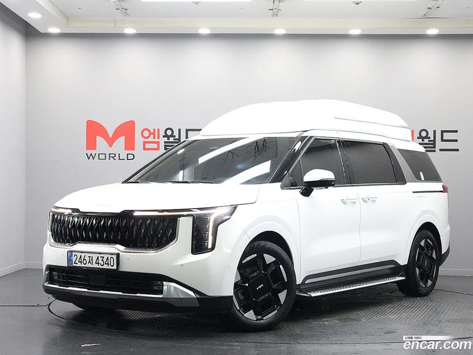 Kia Carnival HEV 7 2024 — фото 1, купить с доставкой в Москву