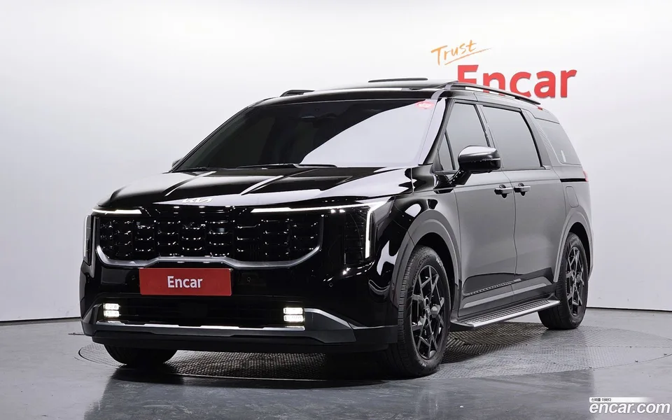 Kia Carnival HEV 7 2024 — фото 1, купить с доставкой в Москву