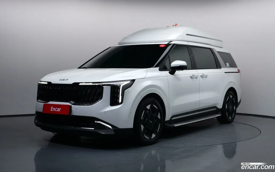 Kia Carnival HEV 7 2024 — фото 1, купить с доставкой в Москву