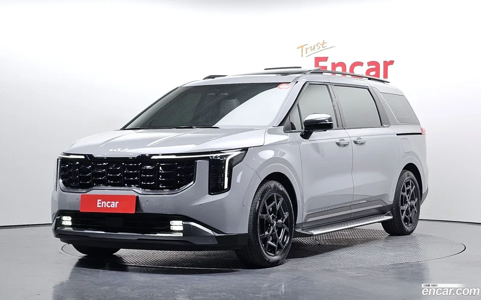 Kia Carnival HEV 7 2024 — фото 1, купить с доставкой в Москву