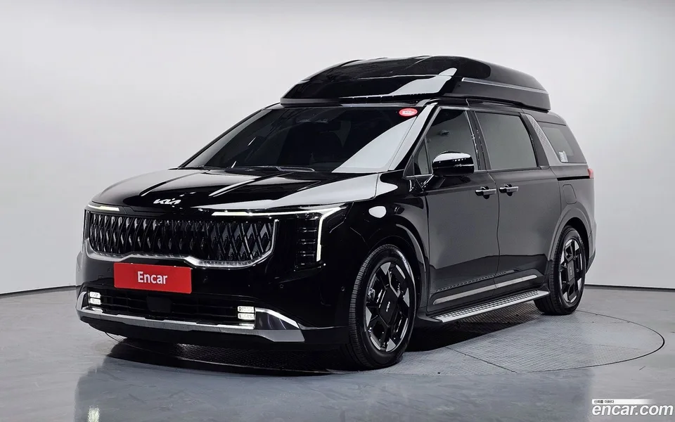 Kia Carnival HEV 7 2024 — фото 1, купить с доставкой в Москву