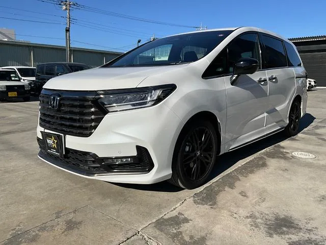 Honda ODYSSEY HYBRID e:HEV ABSOLUTE EX BLACK EDITION 2023 — фото 1, купить с доставкой в Москву