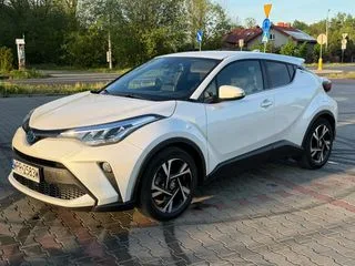 Toyota C-HR 2.0 Hybrid Style 2023 — фото 1, купить с доставкой в Москву